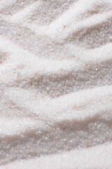 Natural Himalayan Pink Salt Fine Ground Top View Abstract Texture Vertical Background