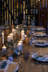 Christmas Table Setting. Holiday Decorations. New Year Celebration. Table served for Christmas dinner