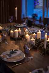 Christmas Table Setting. Holiday Decorations. New Year Celebration. Table served for Christmas dinner