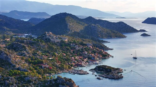 Kekova is a small Turkish island near Demre district of Antalya province which faces the villages of Kalekoy.