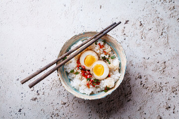 Korean marinated eggs in soy sauce with rice.