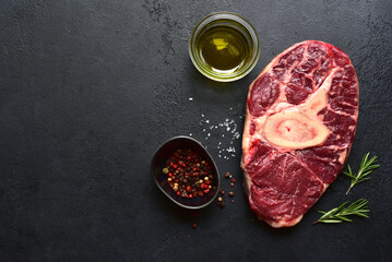 Fresh raw organic beef steak osso buko with ingredients for making. Top view with copy space.