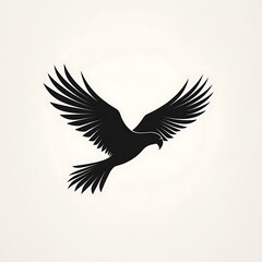 Fototapeta premium Black silhouette of a bird flying with wings spread.