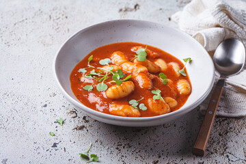 Tomato soup with gnocchi.