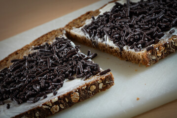 Slice of bread with hagelslaag. Typical Dutch bread breakfast topping