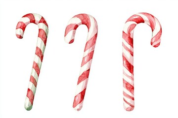 Three colorful candy canes on a white isolated background