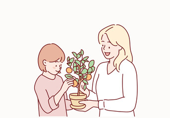 Cute child girl helping her mother to care for plants. Hand drawn style vector design illustrations.
