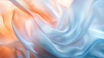 Obraz premium Soft waves of orange and blue fabric flowing together in gentle harmony under soft lighting