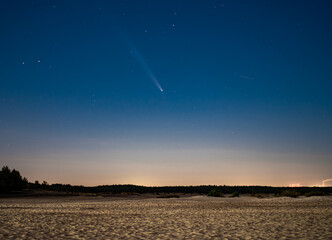 Comet C/2023 A3 Tsuchinshan-ATLAS visible in night sky after sunset in the Desert.