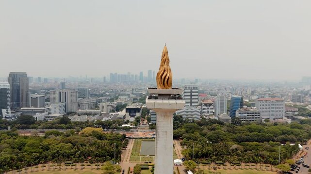 4k aerial cinematic footage of the monumen Nasional in Jakarta close up 2