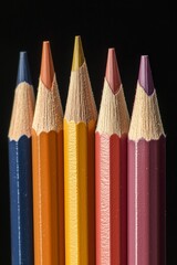 Fototapeta premium A row of sharpened colored pencils