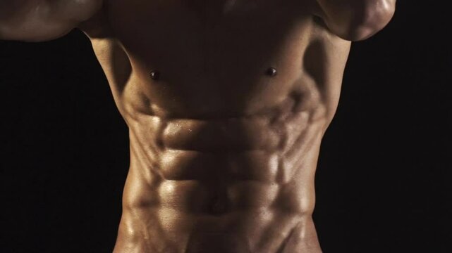 Six pack. Perfect abs, shoulders, and chest. Close up the Abs. Closeup torso. Ab. Muscular torso and ripped abs. Sexy male muscular body. Man with naked torso showing six pack abs.