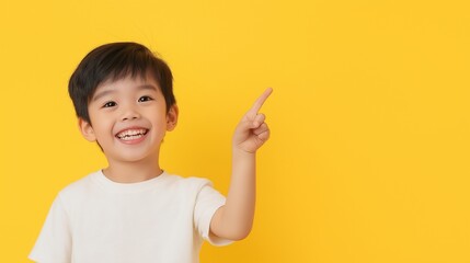 Asian boy pointing finger 