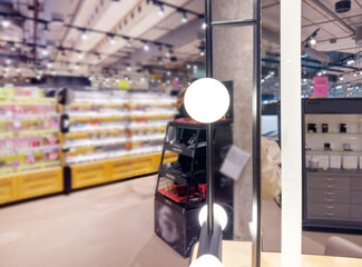 Obraz premium buying make up at cosmetics section in store