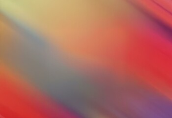 A blurred background of red, orange, yellow, and blue hues, blending together in a gradient.