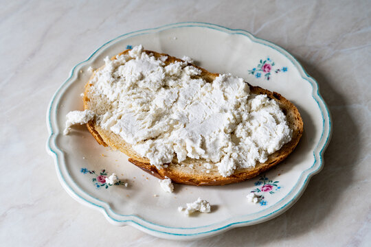 Turkish Lor Cheese with Olive Oil on Bread.
