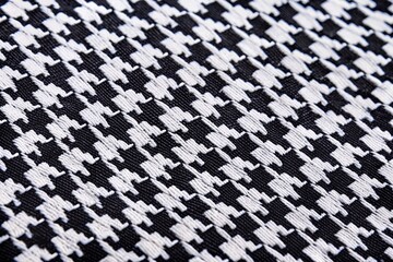 Obraz premium Elegant Black and White Houndstooth Pattern for Fashion and Textile Design