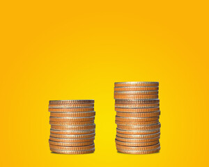 stack of coins with yellow background.