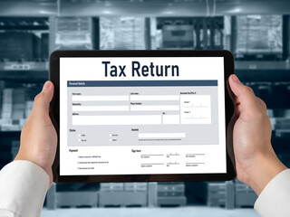 Online tax return form for submitting individual income tax return form snugly on the internet website. Government web for tax payment and return. Taxation technology concept.