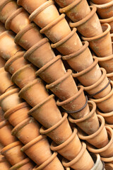 handmade clay pottery as background.