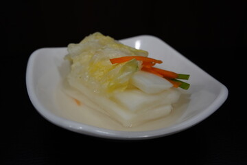 White kimchi is a type of kimchi made without using red pepper powder in Korean cuisine