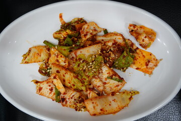 Fresh kimchi is a type of kimchi made by immediately seasoning vegetables such as cabbage