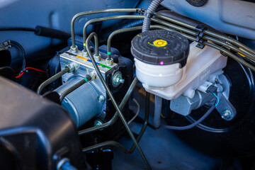 ABS Motor Control Module, High Pressure Pump in Car Engine Room (Anti-lock Braking System) is a popular braking system installed in modern cars.