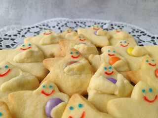 Smiling Star-Shaped Cookies with Colorful Candies