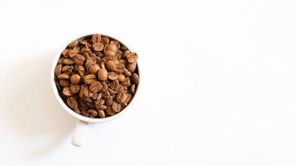 A white cup atop a bed of coffee beans, capturing the essence of fresh coffee and convenience. 