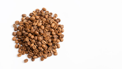Many roasted coffee beans isolated on white, top view
