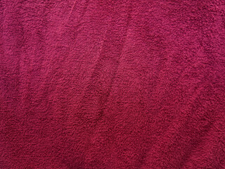 Magenta shower towel texture. Fluffy carpet background. Blank bathroom textile. Warm sweater natural material. Soft baby fabric backdrop detail. Magenta flat surface