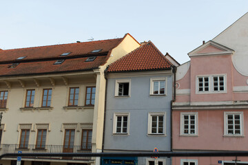 The cityscape is adorned with colorful and vibrant architecture, showcasing a stunning array of unique styles