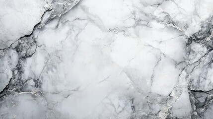 Fototapeta premium A white marble wall with cracks and crevices