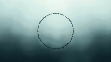 A dripping circle against a blue background