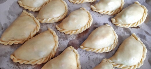 Jalangkote or pastel cake. Preparation for fried. Famous culinary from Makassar South Sulawesi Indonesia. Filled egg, potato, carrot, vegetable served with chili