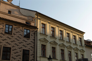 The elegant facade of historic buildings is beautifully basking in the warm and inviting golden hour light