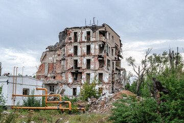 The remains of city buildings after massive artillery shelling and airstrikes.