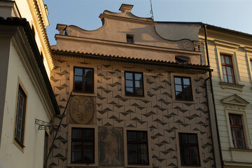 A beautifully patterned building facade that intricately showcases various historic architectural...