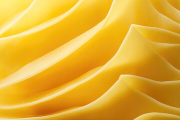 Obraz premium Close-up of Smooth, Golden-Yellow, Swirling Butter