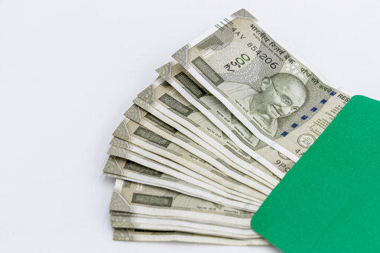 Indian currency 500 rupee bank note on white background, Five hundred Indian rupee bank paper currency note, Group of money stack of 500 Indian Rupee banknote.