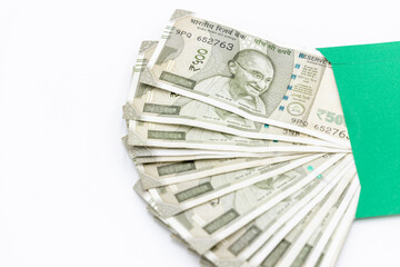 Indian currency 500 rupee bank note on white background, Five hundred Indian rupee bank paper currency note, Group of money stack of 500 Indian Rupee banknote.