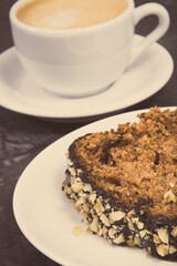 Fresh pastry made of zucchini and cup of white coffee. Delicious dessert