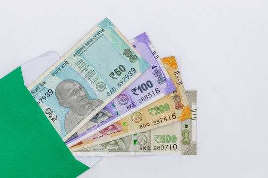 Indian currency 500 rupee bank note on white background, Five hundred Indian rupee bank paper currency note, Group of money stack of 500 Indian Rupee banknote.