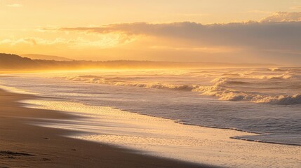 Fototapeta premium A quiet beach at golden hour with gentle waves and a warm, golden glow, perfectly capturing the peacefulness of sunset