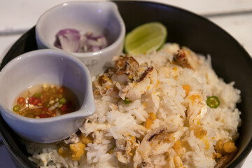 Steamed rice mixed crab add flavor to food with chili and lime. Delicious easy dish with crab.
