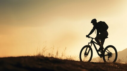 Obraz premium photo side view sillhuette of man riding a bicycle bike uphill with natural light.
