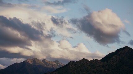 Stunning Time-Lapse of Clouds Over Mountain Peaks in Soft Light