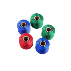 Colorful spools of thread on White Background