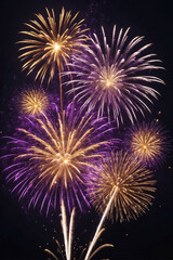 Spectacular gold and dark violet fireworks illuminating the New Year night sky