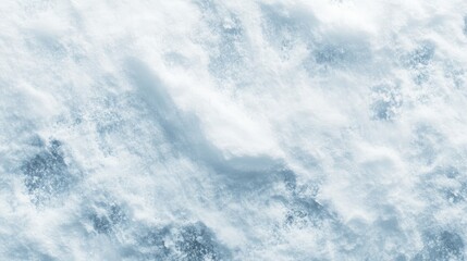 A textured surface of frothy water, showcasing dynamic white waves against a deeper blue background.